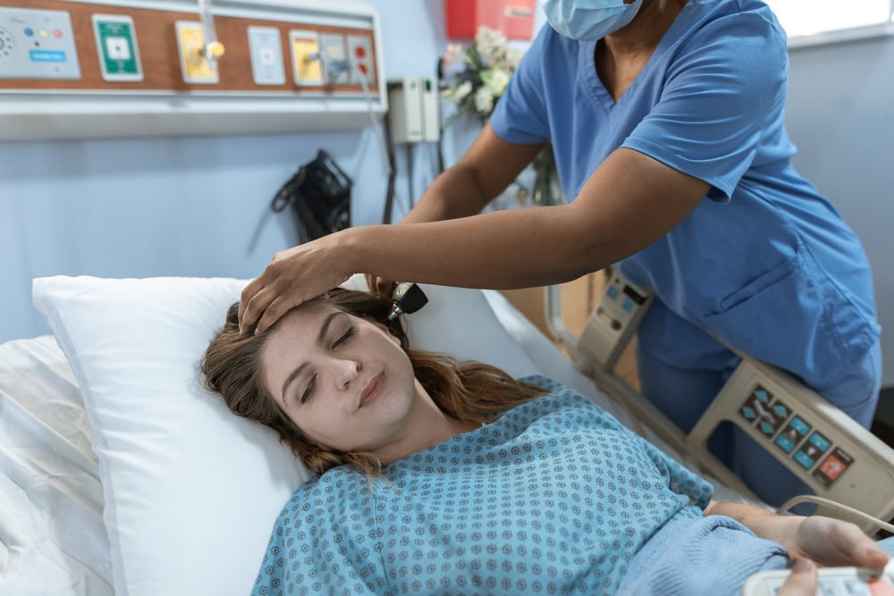 A nurse examining a patient